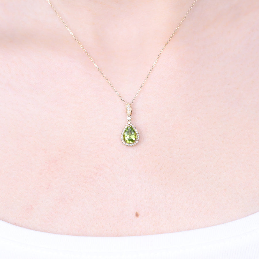 Violet 14K Yellow Gold Pear-Cut Manchurian Peridot Pendant